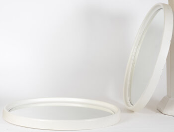A pair of circular vintage resin mirrors, 1960-1970's