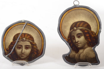 Two stained glass fragments depicting angels