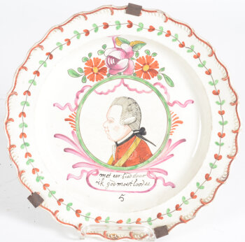 A probably Leeds creamware 'Oranjebord' with a portrait of Willem V of Orange, late 18th century