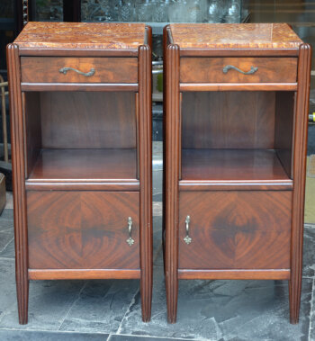 A pair of art deco night stands in mahogany and onyx marble