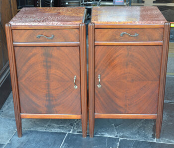 A pair of small art deco cupboards with onyx marble top