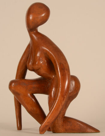 Luc Goossens crouching figure in wood