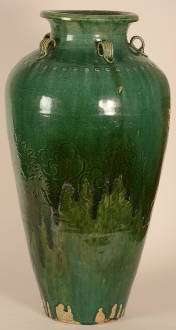 A green glazed large martaban with incised dragon motif