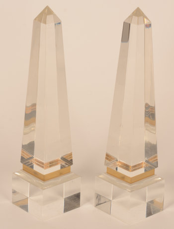 A pair of perspex or lucite obelisks