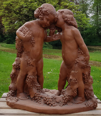 Geo Verbanck two putti holding grapes and vines a monumental sculpture