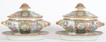 Two oval Canton famille rose tureens on saucers